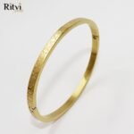 Mouni Cross Band Gold Bracelet For Women - Image 2