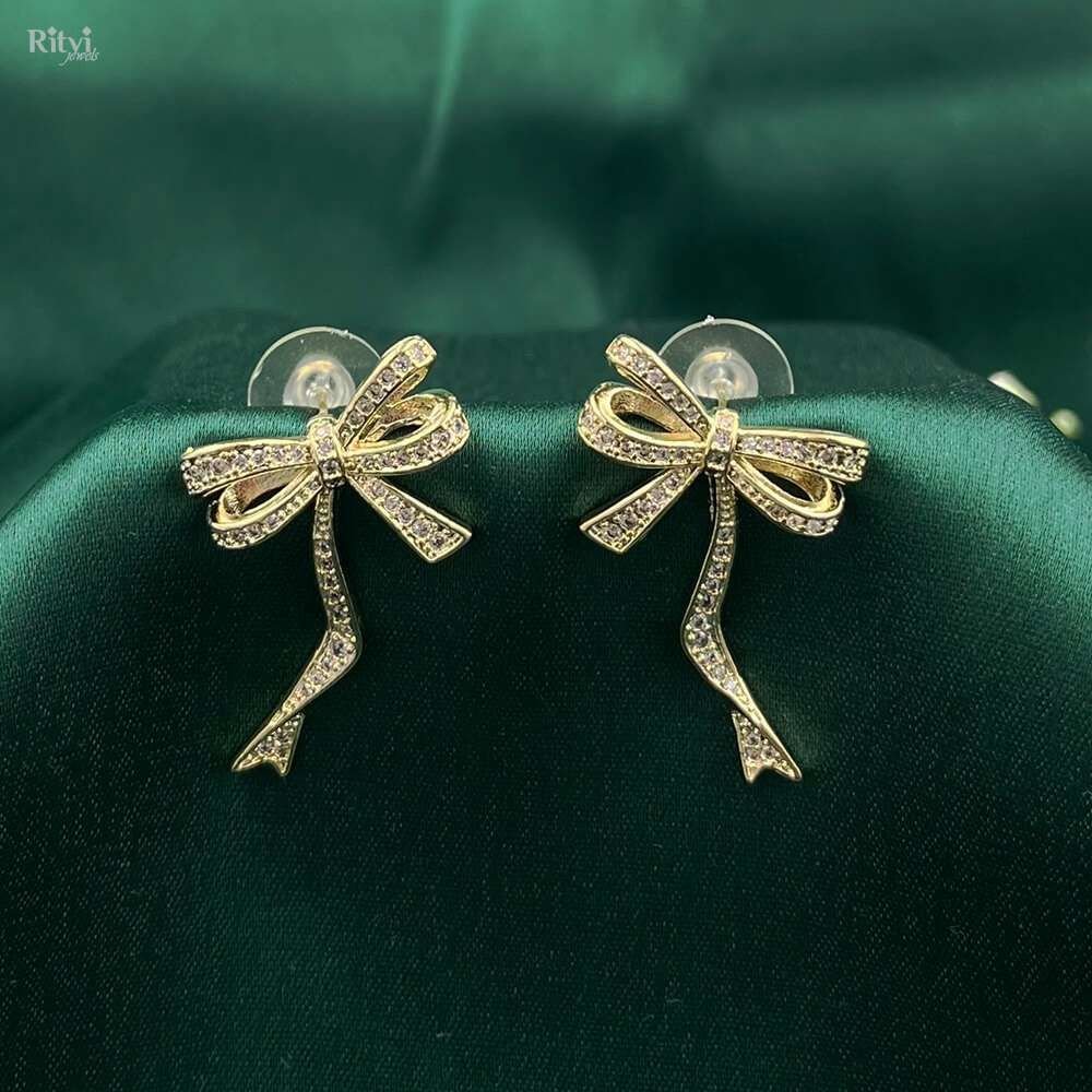 bow-2.jpg Bow Gold Fashion Earrings - Image 1