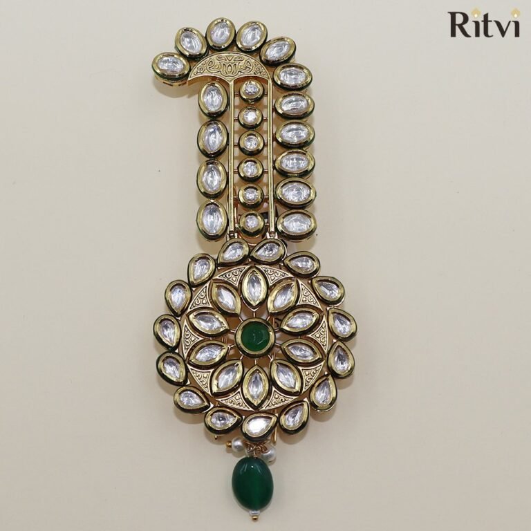 Royal Kundan groom kalgi with green gemstone, white stones and intricate gold detailing for Indian wedding