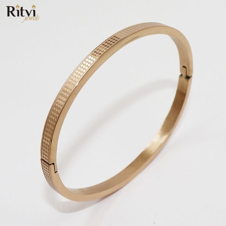 Gold-plated textured kada bracelet for women by Ritvi Jewels