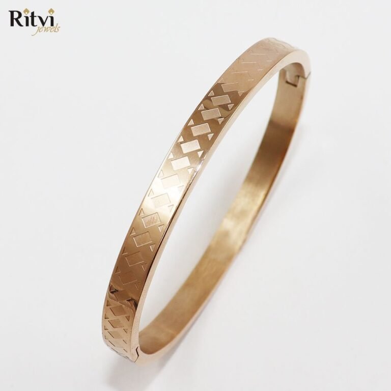Gold-plated geometric pattern kada bracelet for women by Ritvi Jewels