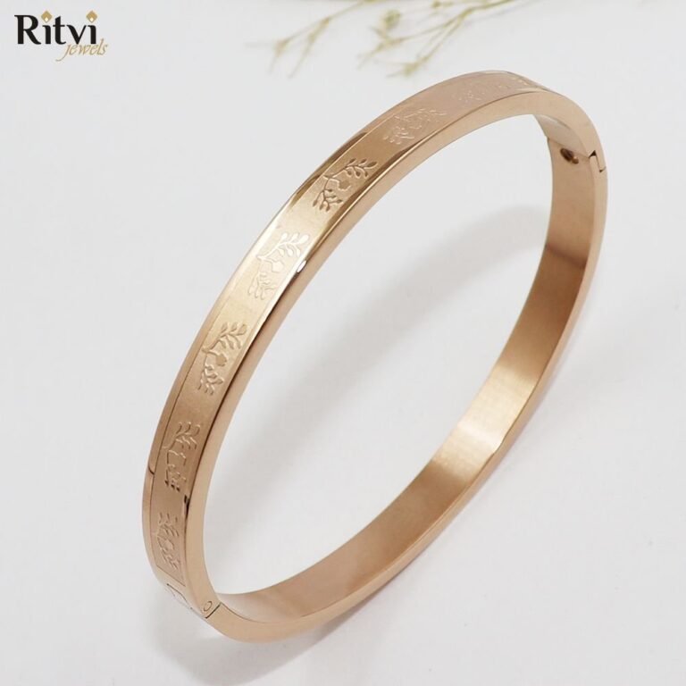 Gold-plated floral engraved kada bracelet for women by Ritvi Jewels