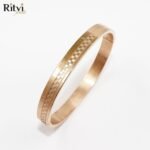 Gold-plated geometric line pattern kada bracelet for men by Ritvi Jewels
