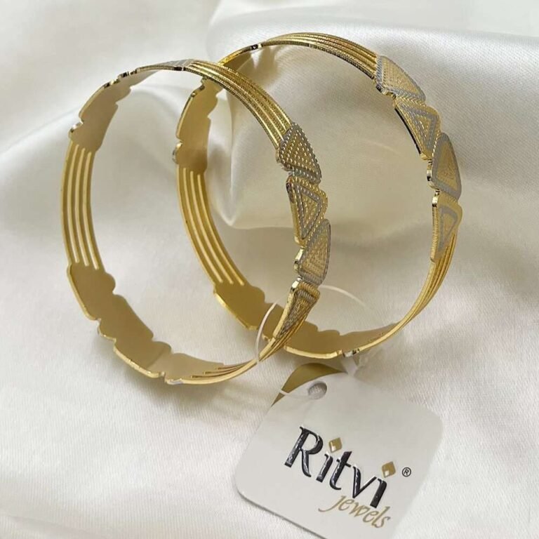 Elegant gold-toned designer bangles with geometric patterns and delicate textured detailing
