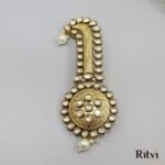 Elegant Kundan groom kalgi with gold detailing, sparkling white stones, engraved patterns and pearl drops for Indian wedding