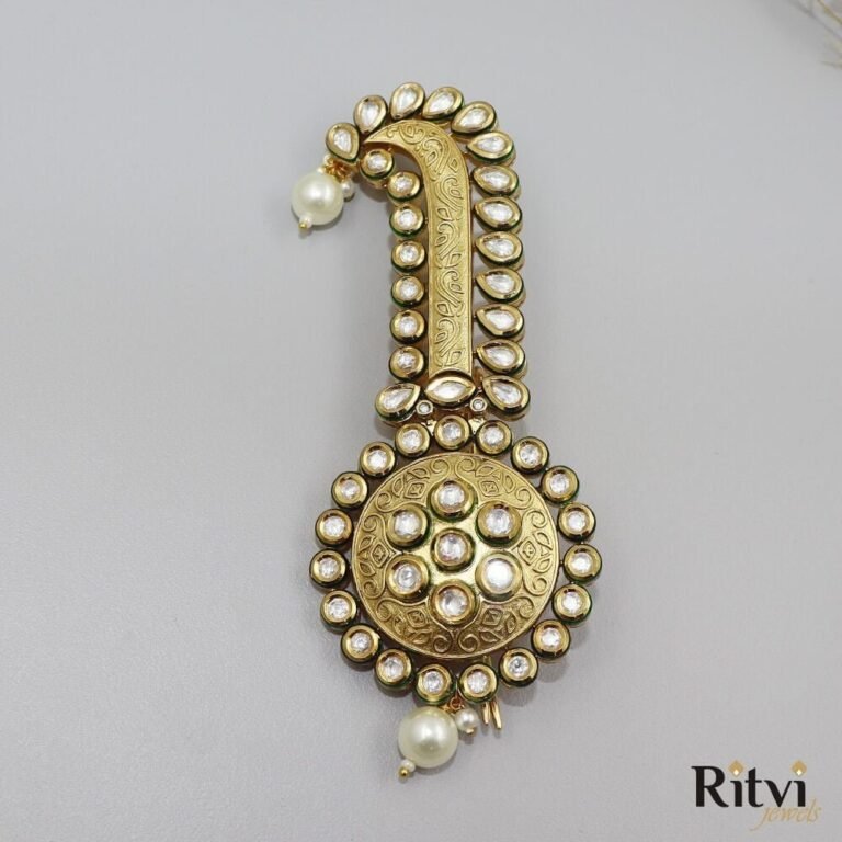 Elegant Kundan groom kalgi with gold detailing, sparkling white stones, engraved patterns and pearl drops for Indian wedding
