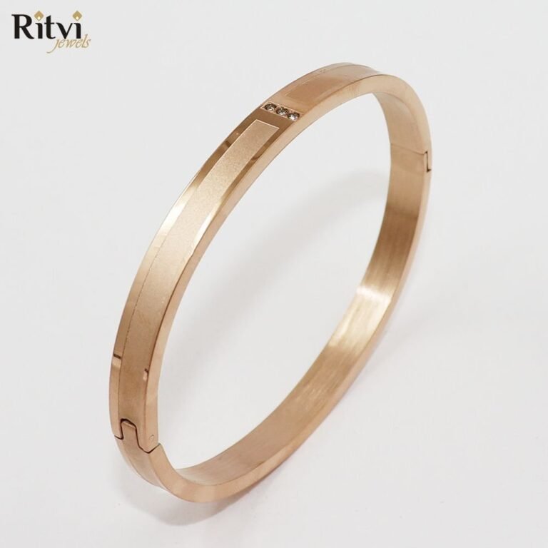 Rose gold-toned elegant bracelet with sleek design and crystal detailing