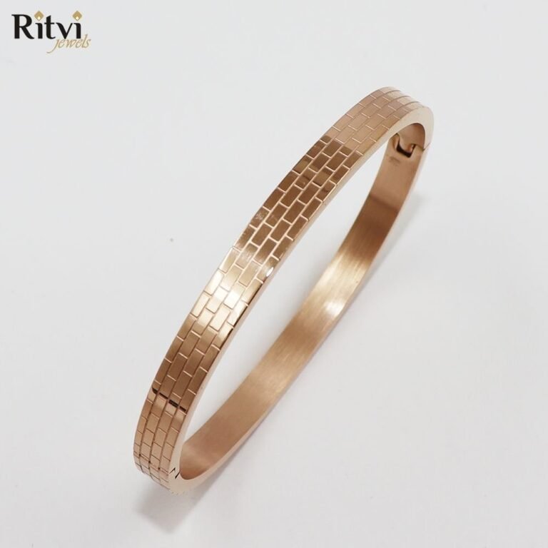 Rose Gold-toned bracelet with elegant textured brick-pattern design