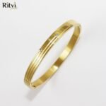Gold-plated multi-line kada bracelet with crystal accents for women by Ritvi Jewels