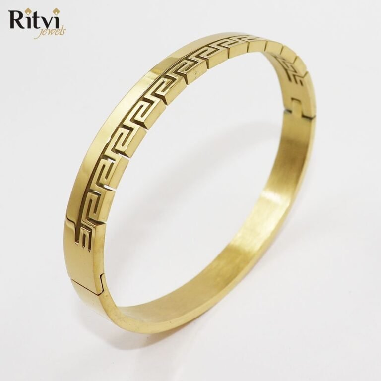Gold-toned bracelet with elegant Greek key geometric pattern design