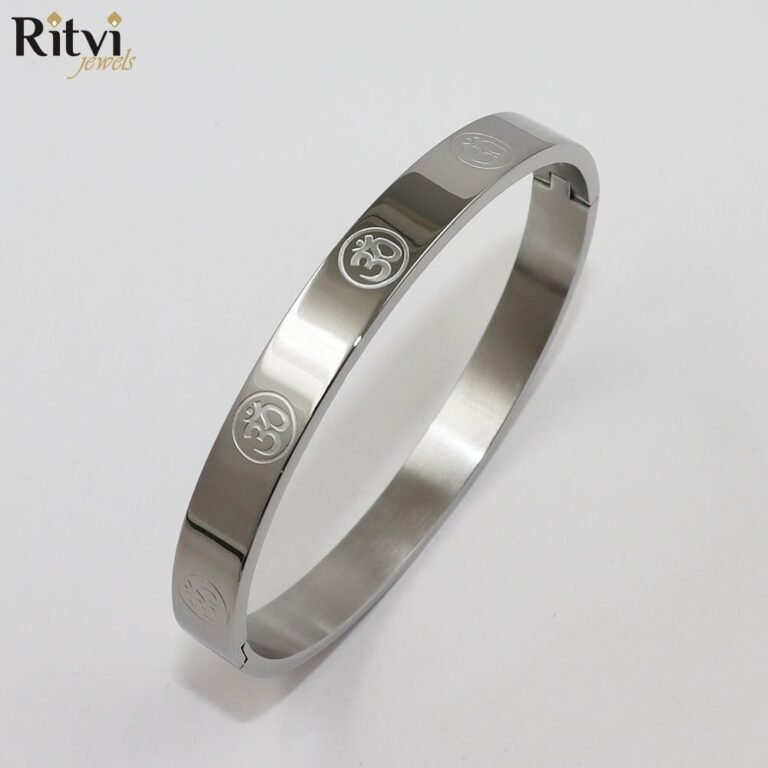 Silver-tone kada bracelet with Om symbol engravings by Ritvi Jewels