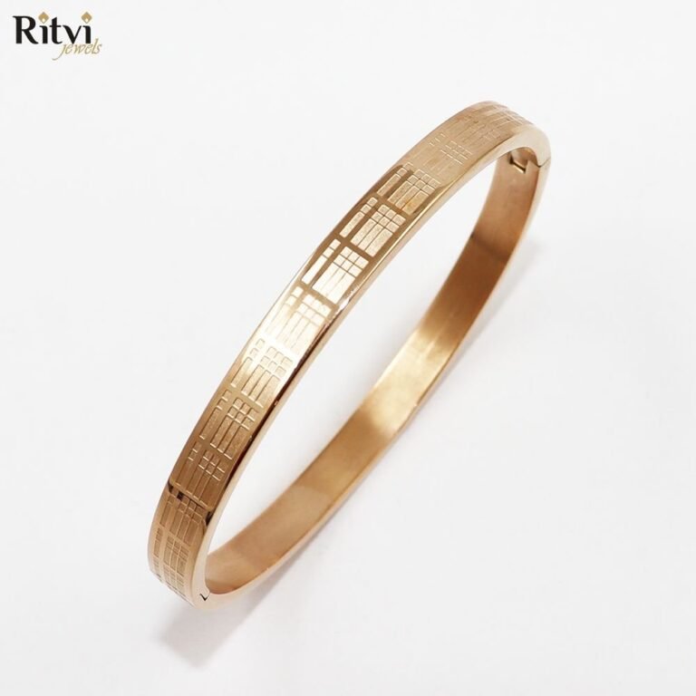 Gold-plated geometric pattern kada bracelet for women by Ritvi Jewels